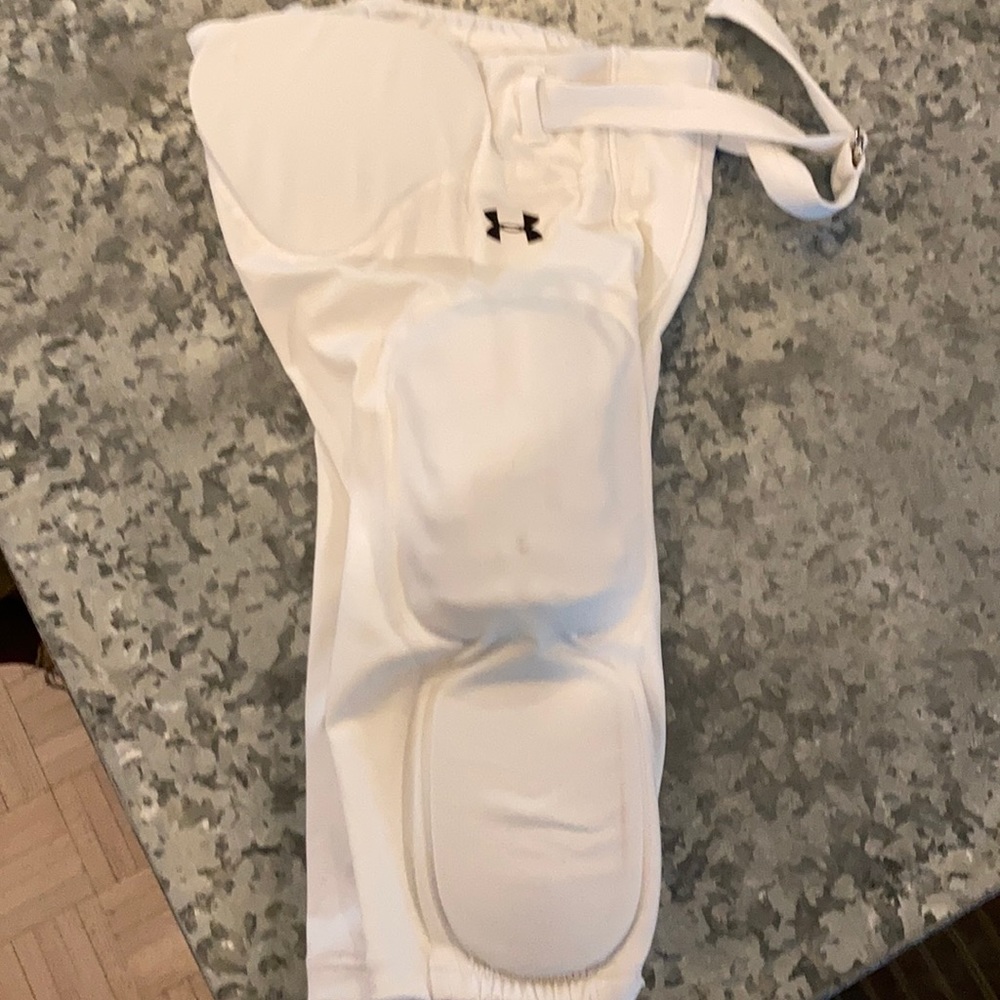 Under Armour pads. Like new.